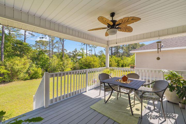 144 American Court Santa Rosa Beach, FL 32459 - Photo 5 of 19 a view of a dining room with furniture window and outside view