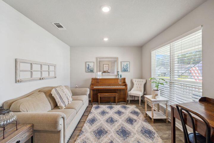 144 American Court Santa Rosa Beach, FL 32459 - Photo 8 of 19 a bedroom with furniture and a large window