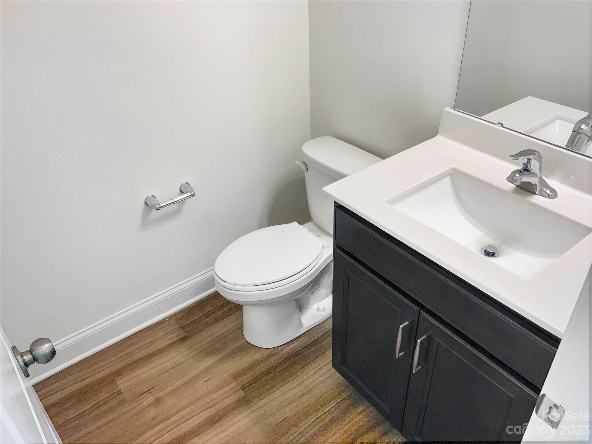 208 Waterlynn Ridge Road, Unit B Mooresville, NC 28117 - Photo 12 of 21 a bathroom with a sink and a toilet