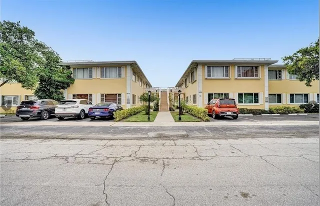 a car parked in front of a building