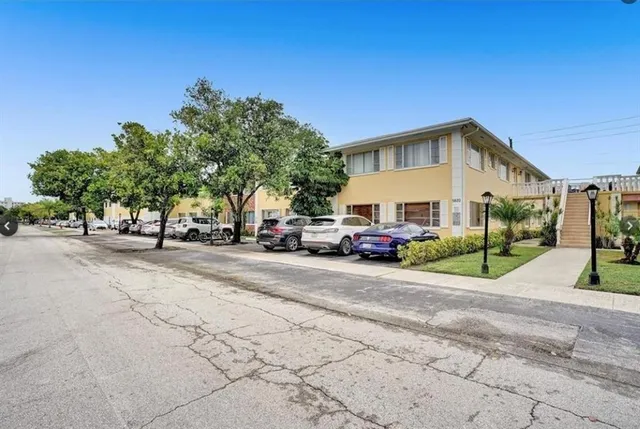 a view of a house with a street
