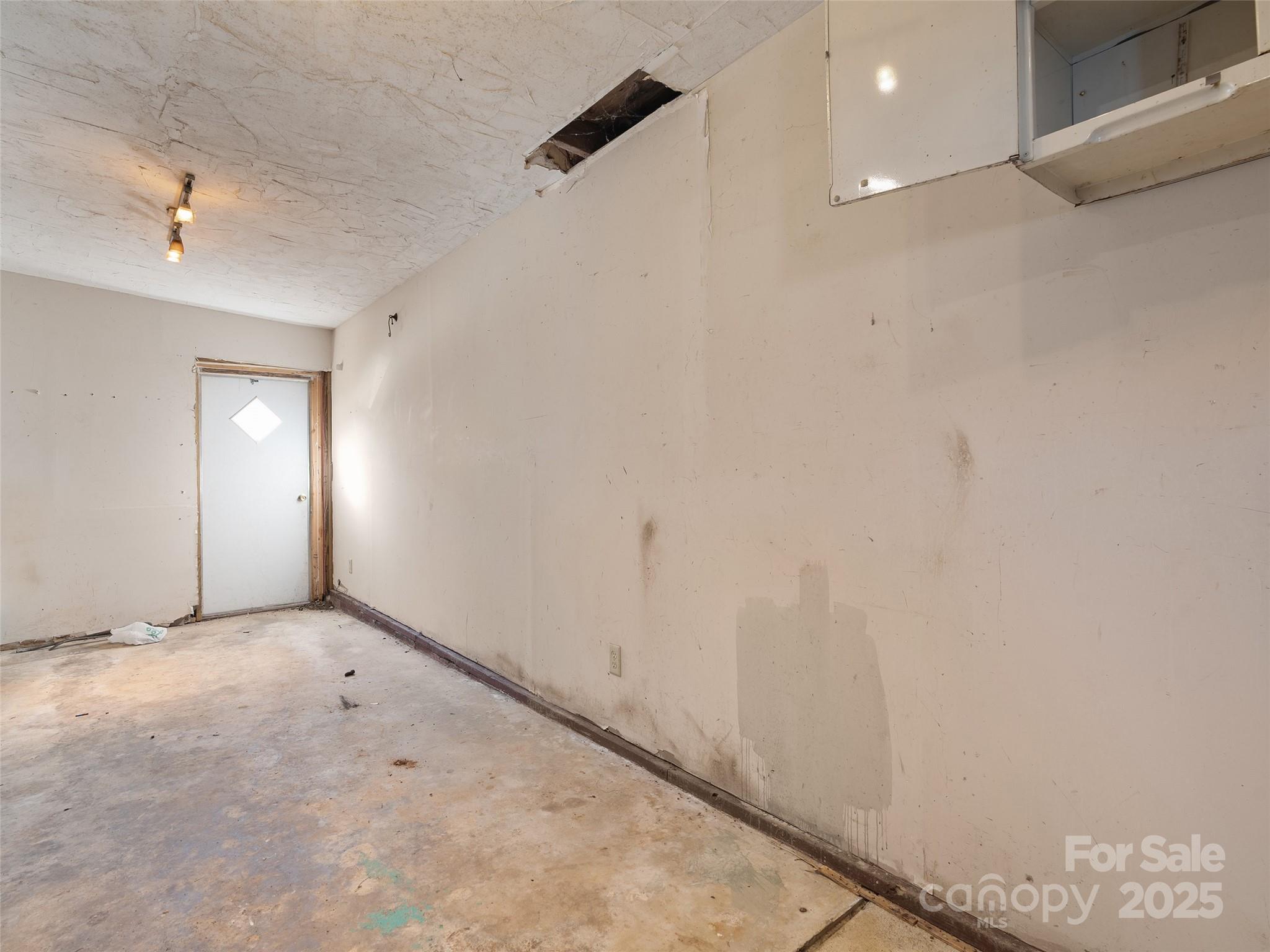 36 Lambert Lane Canton, NC 28716 - Photo 13 of 15 an empty room with windows