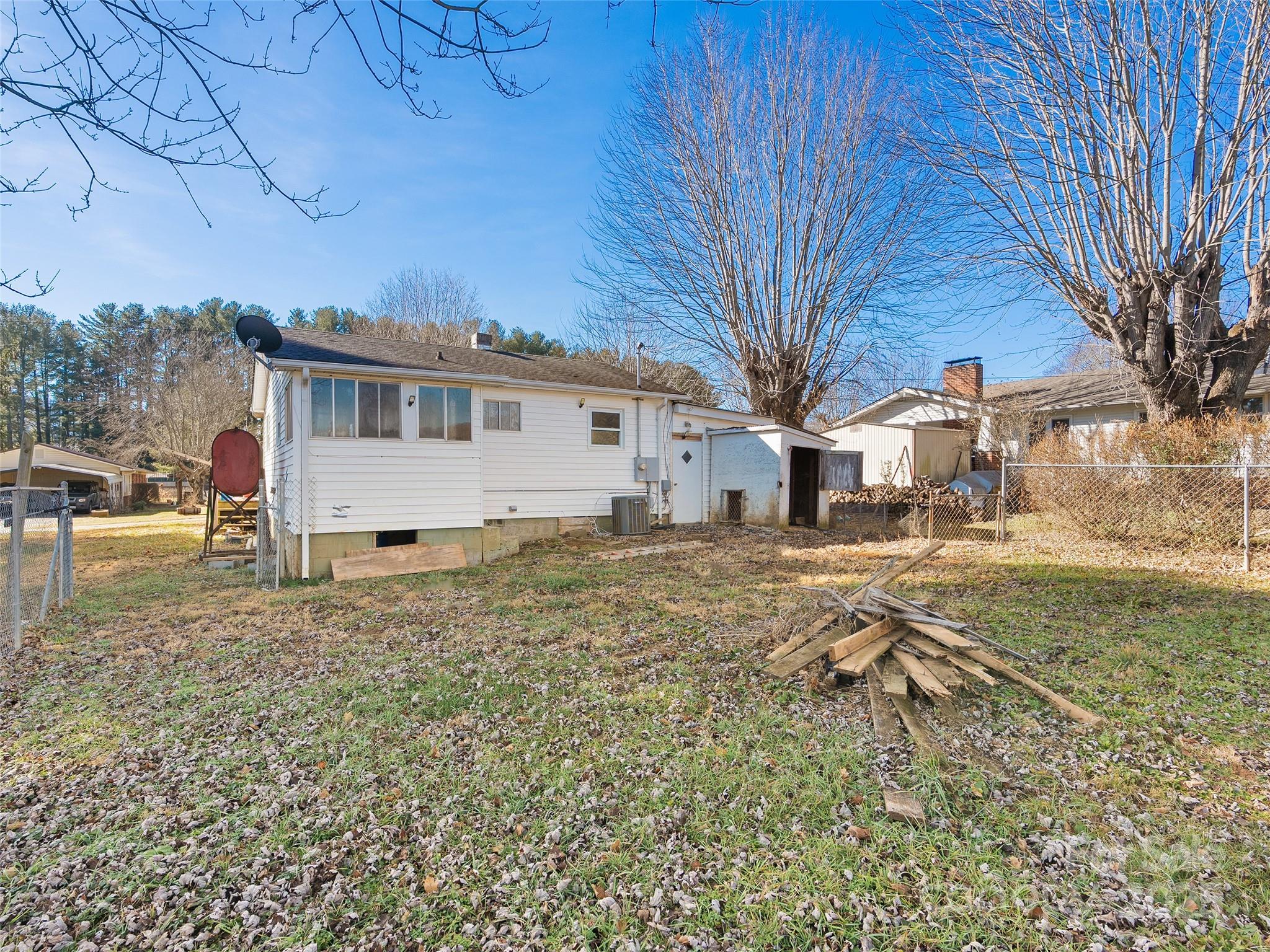 36 Lambert Lane Canton, NC 28716 - Photo 14 of 15 a view of a house with a yard