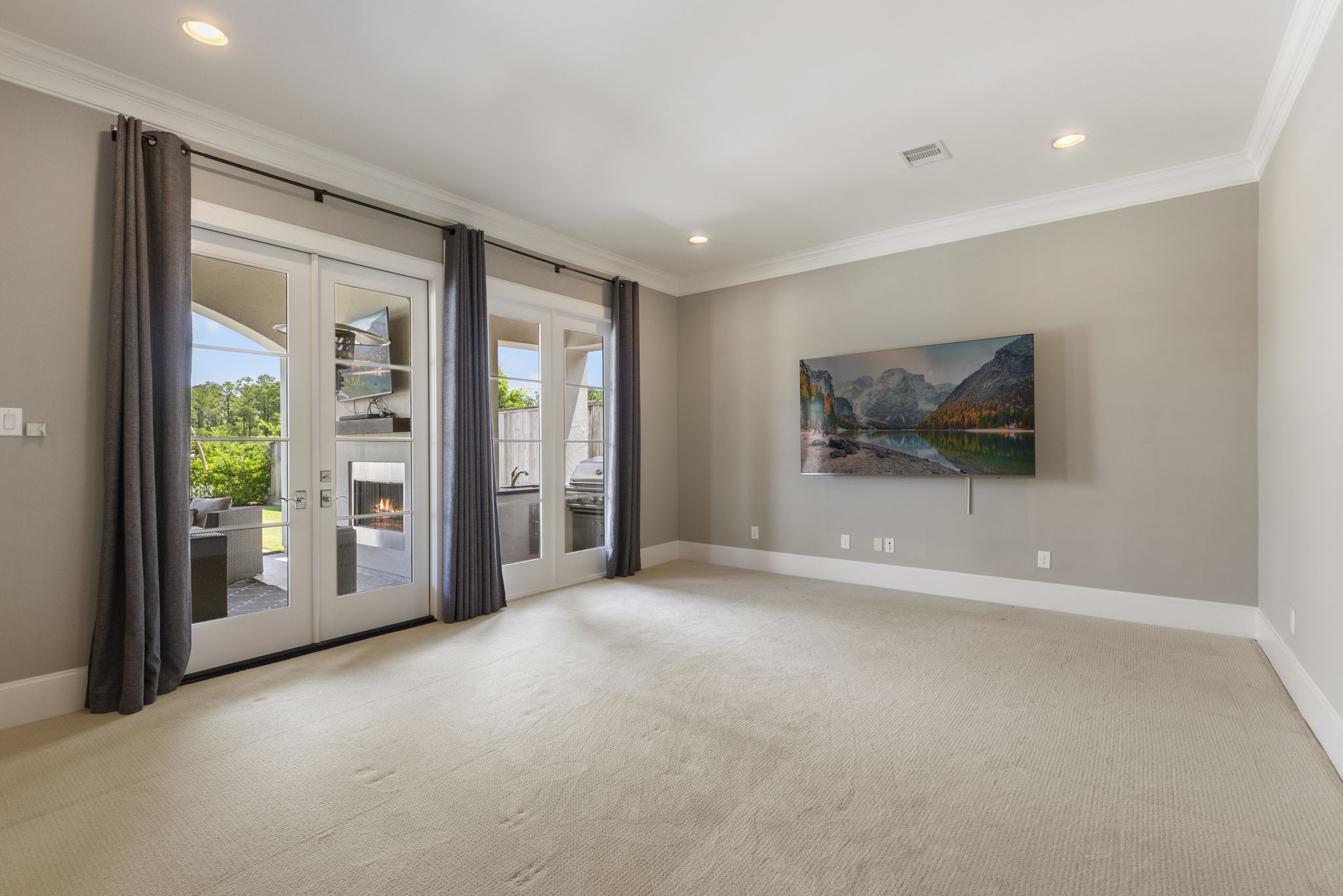 6806 West Warwick Lake Lane Spring, TX 77389 - Photo 25 of 50 a view of an empty room with glass door and balcony