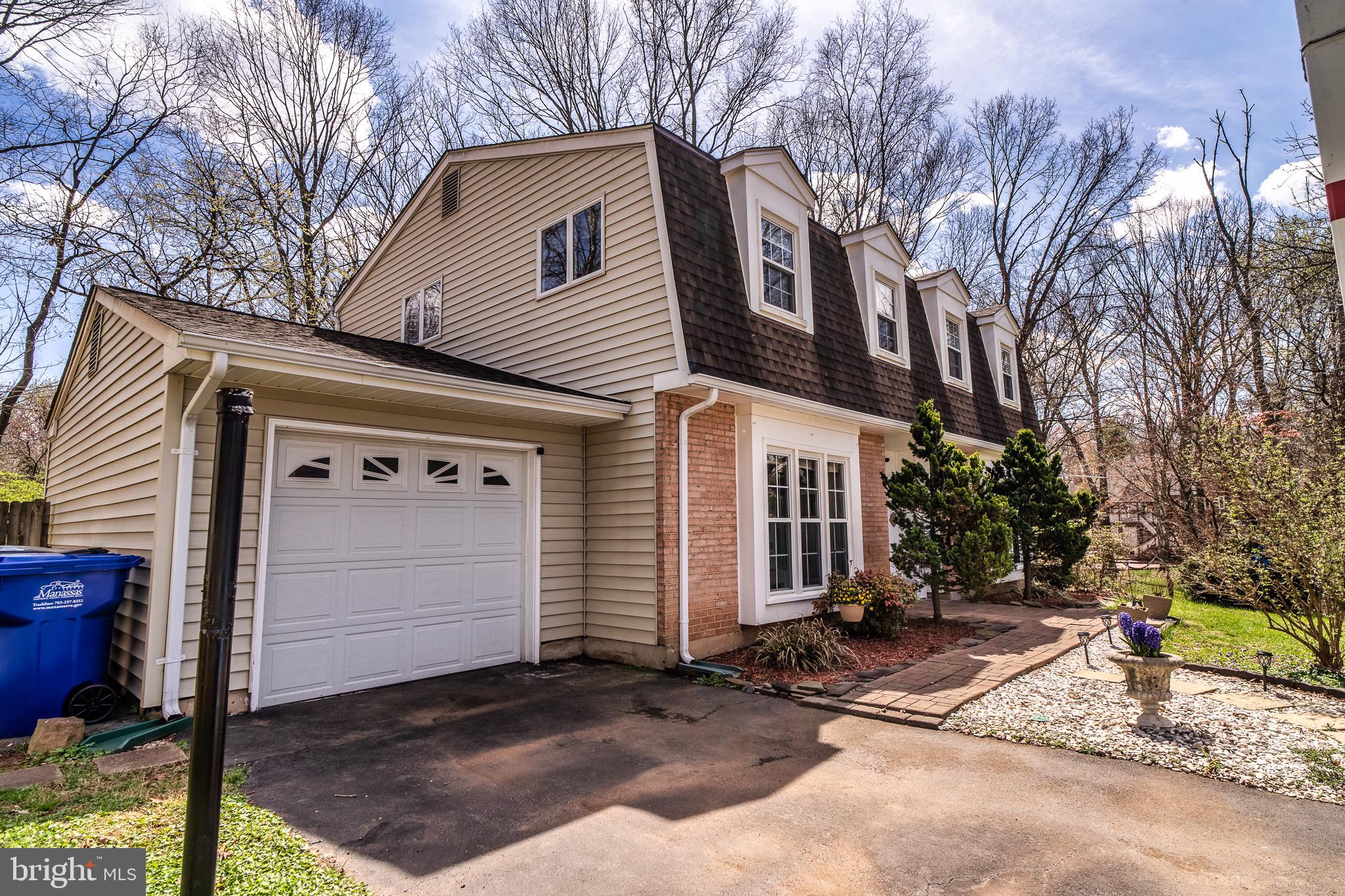 8605 Stonewall Road Manassas, VA 20110 - Photo 2 of 42 A charming 2-level Colonial Dutch