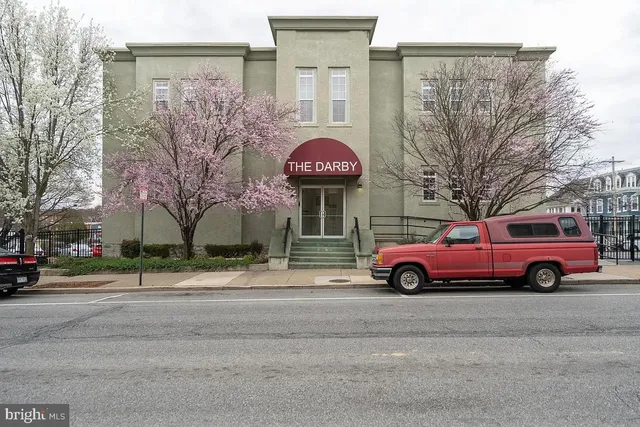 a houses on the side of a street