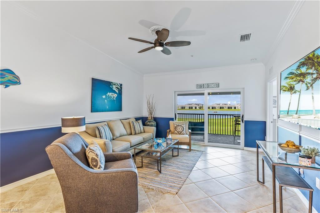 15990 Grassland Lane, Unit 3025 Babcock Ranch, FL 33982 - Photo 4 of 14 a living room with furniture and a window