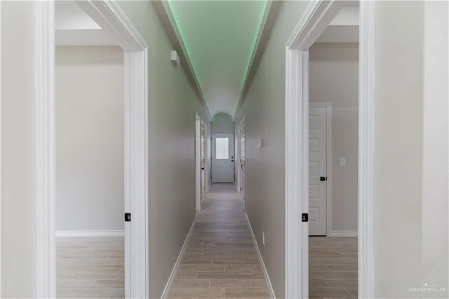 a bathroom with a toilet a sink and shower