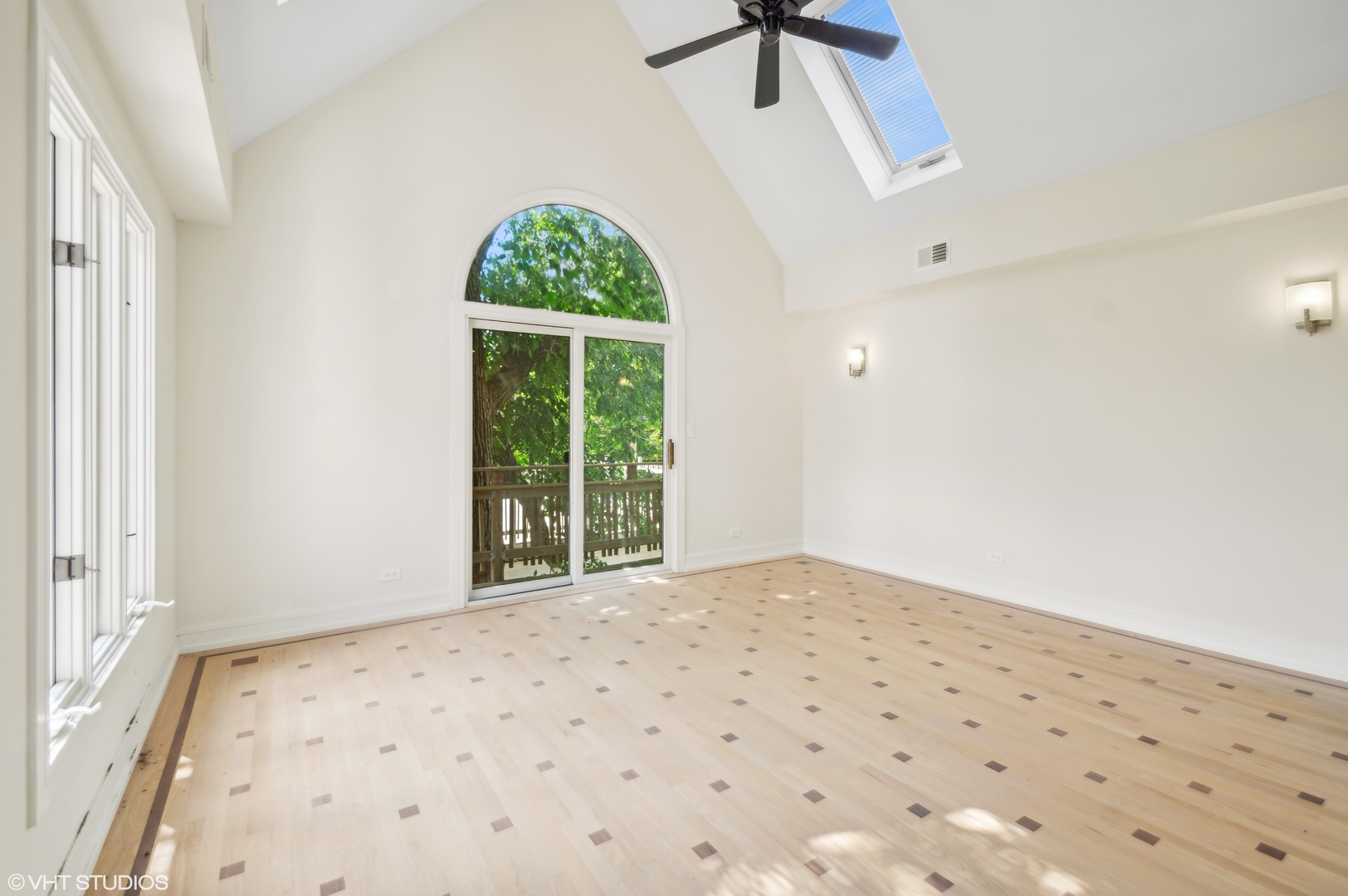 4110 North Kenneth Avenue Chicago, IL 60641 - Photo 15 of 28 a view of an empty room and window with a ceiling fan