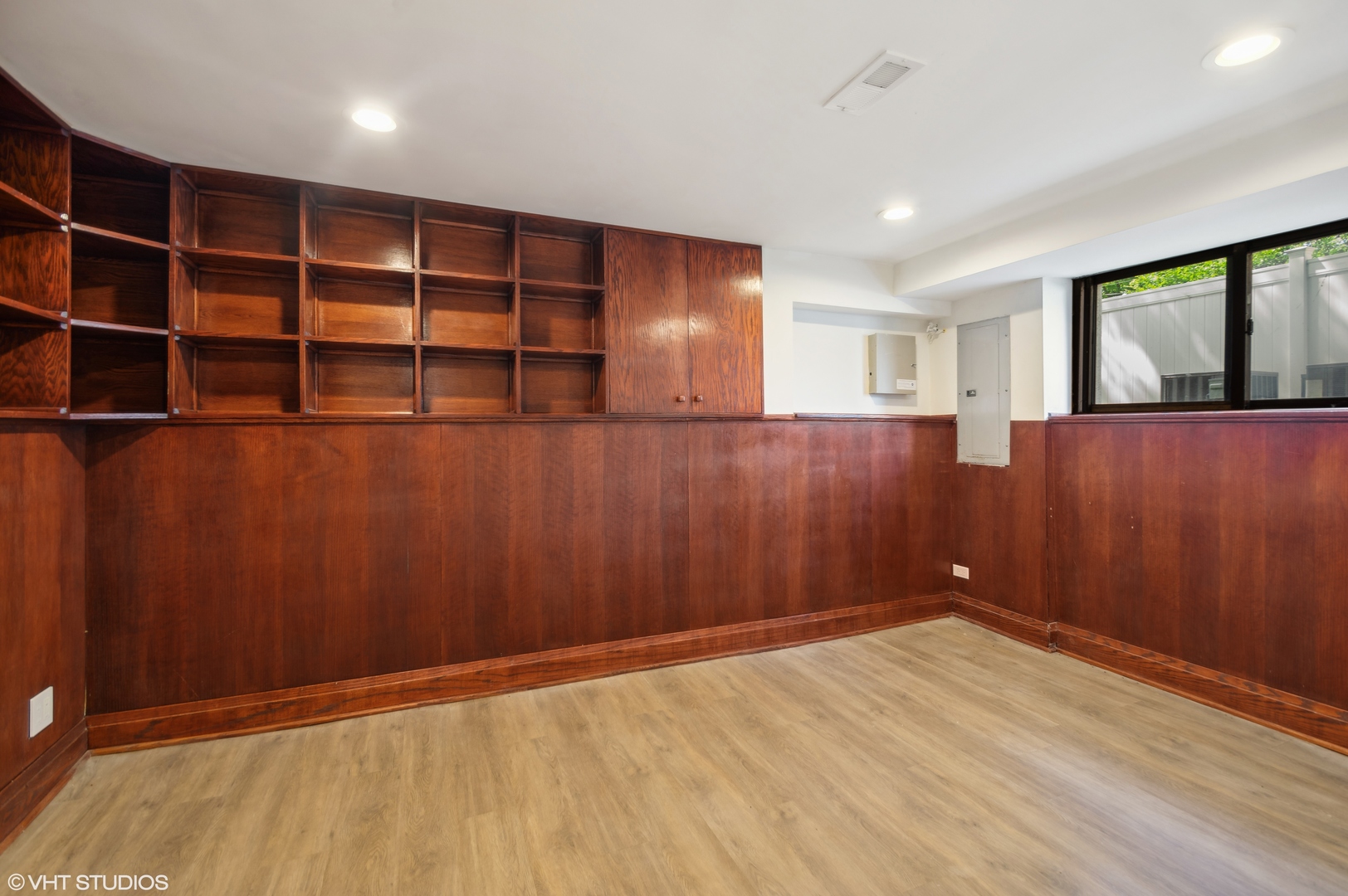 4110 North Kenneth Avenue Chicago, IL 60641 - Photo 20 of 28 a view of an empty room with cabinet and a window