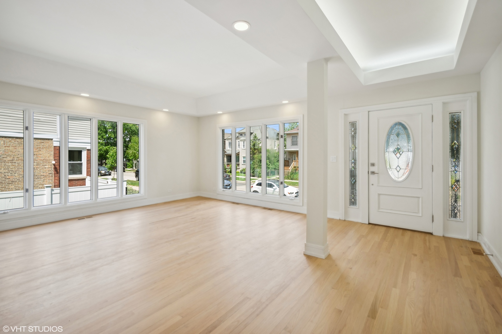 4110 North Kenneth Avenue Chicago, IL 60641 - Photo 2 of 28 a view of a big room with wooden floor and windows