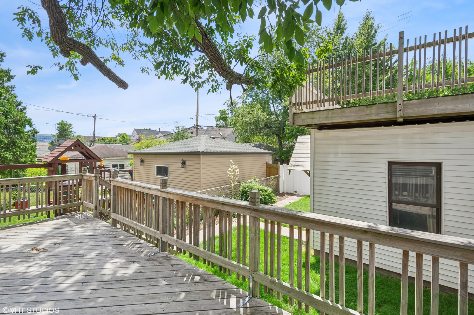 4110 North Kenneth Avenue Chicago, IL 60641 - Photo 23 of 28 a view of a house with a deck
