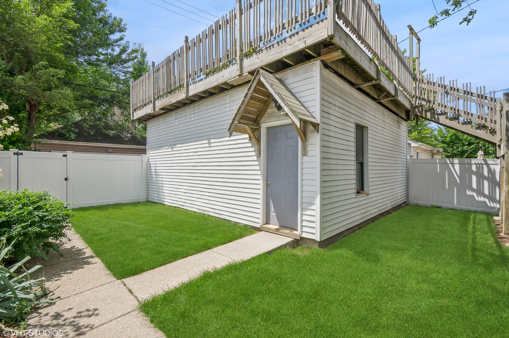 4110 North Kenneth Avenue Chicago, IL 60641 - Photo 24 of 28 a view of a house with a yard