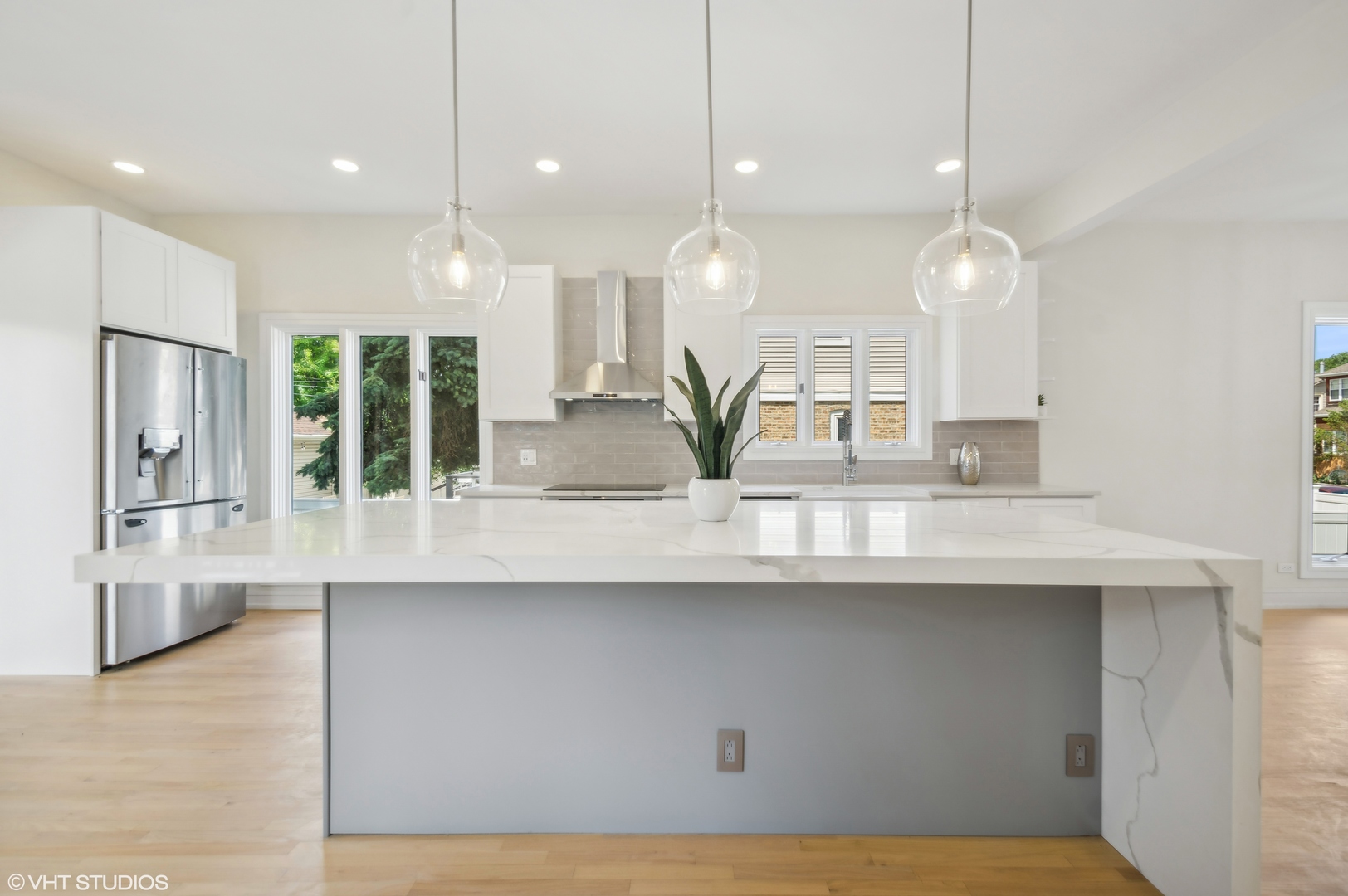 4110 North Kenneth Avenue Chicago, IL 60641 - Photo 10 of 28 a kitchen with counter top space cabinets and stainless steel appliances
