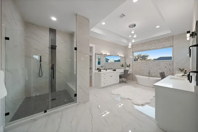 an empty room with ceiling fan and window