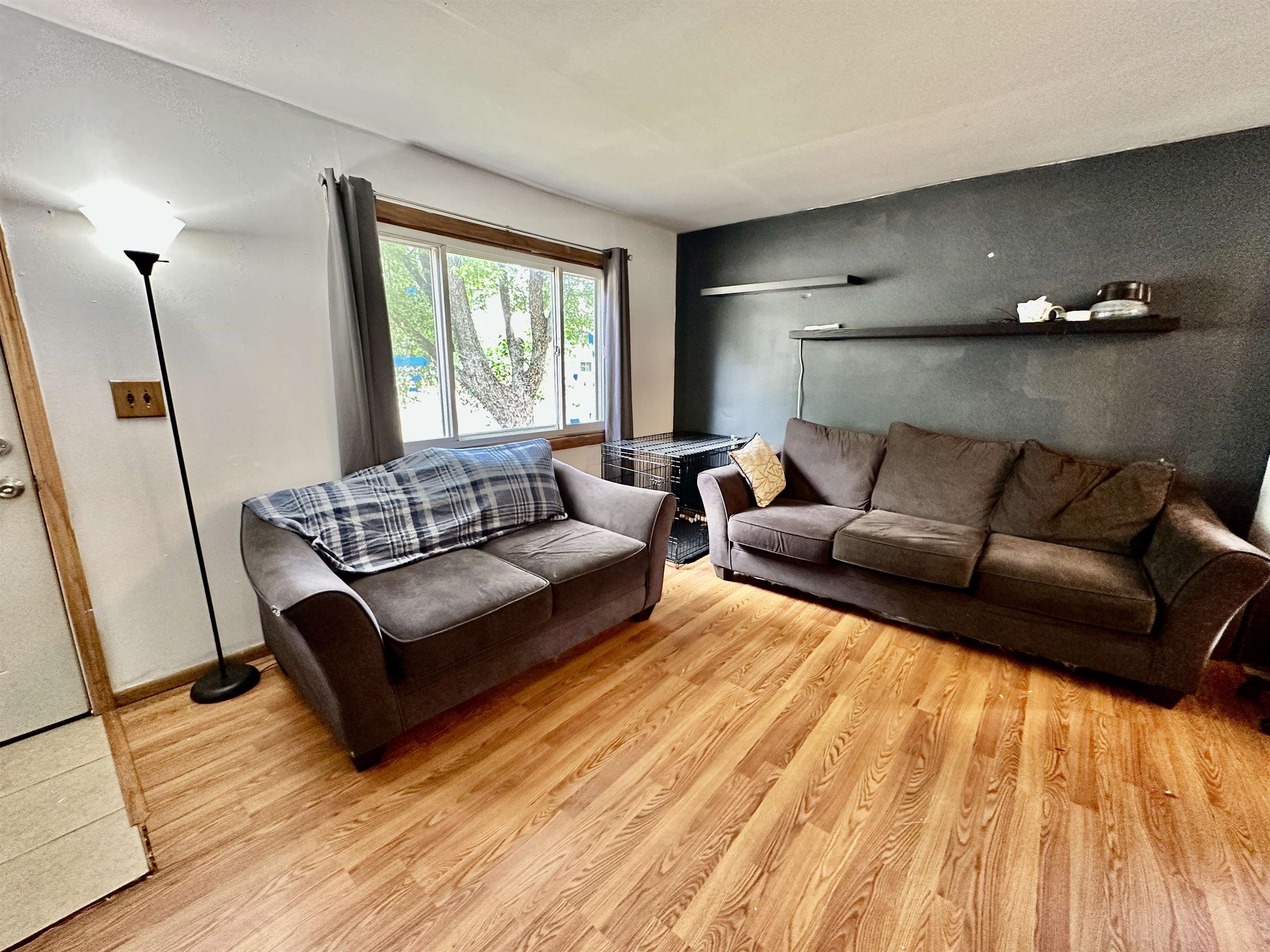 7611 Randy Road Machesney Park, IL 61115 - Photo 7 of 16 a living room with furniture and a window