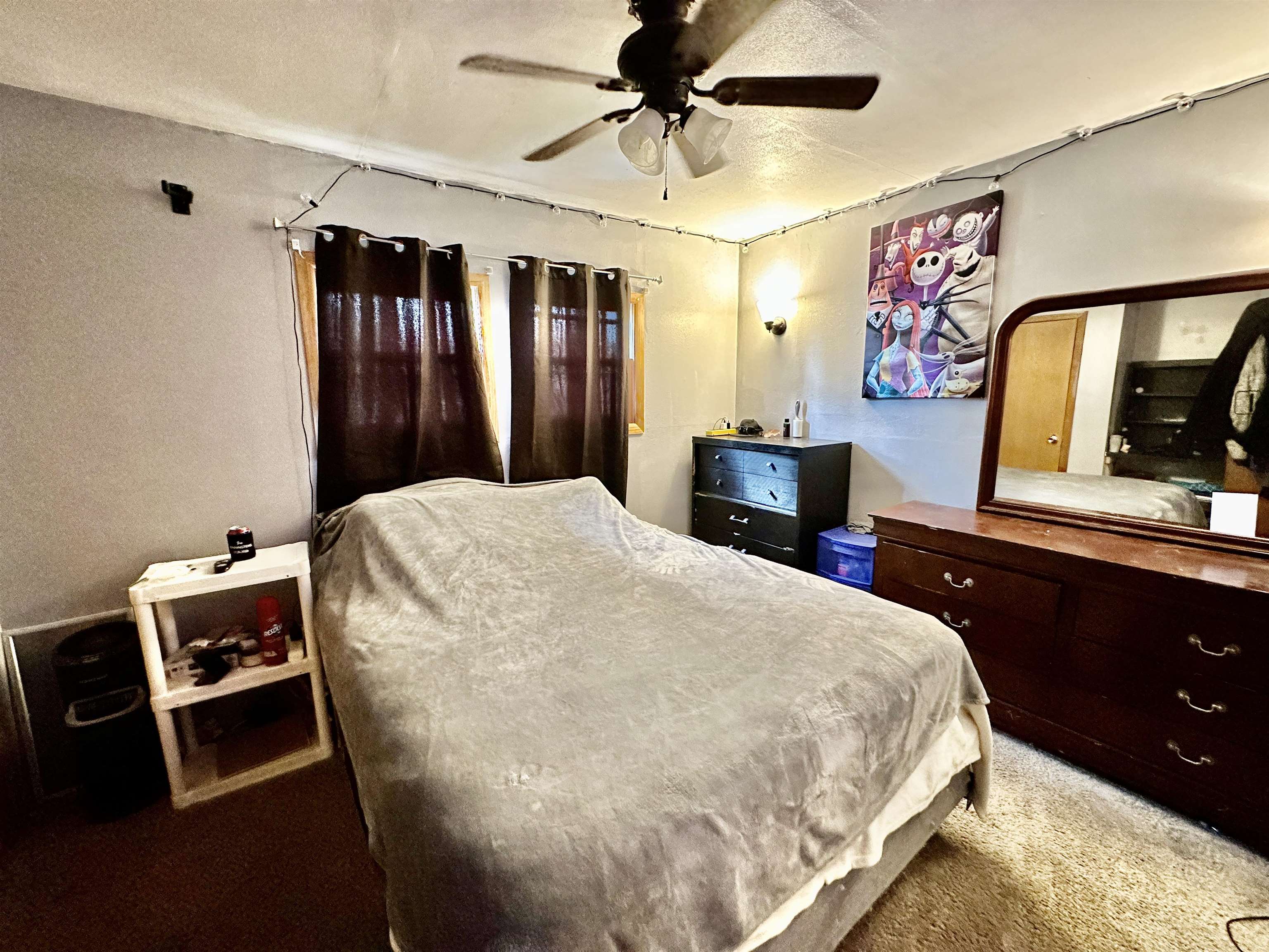 7611 Randy Road Machesney Park, IL 61115 - Photo 10 of 16 a bedroom with a bed and a dresser