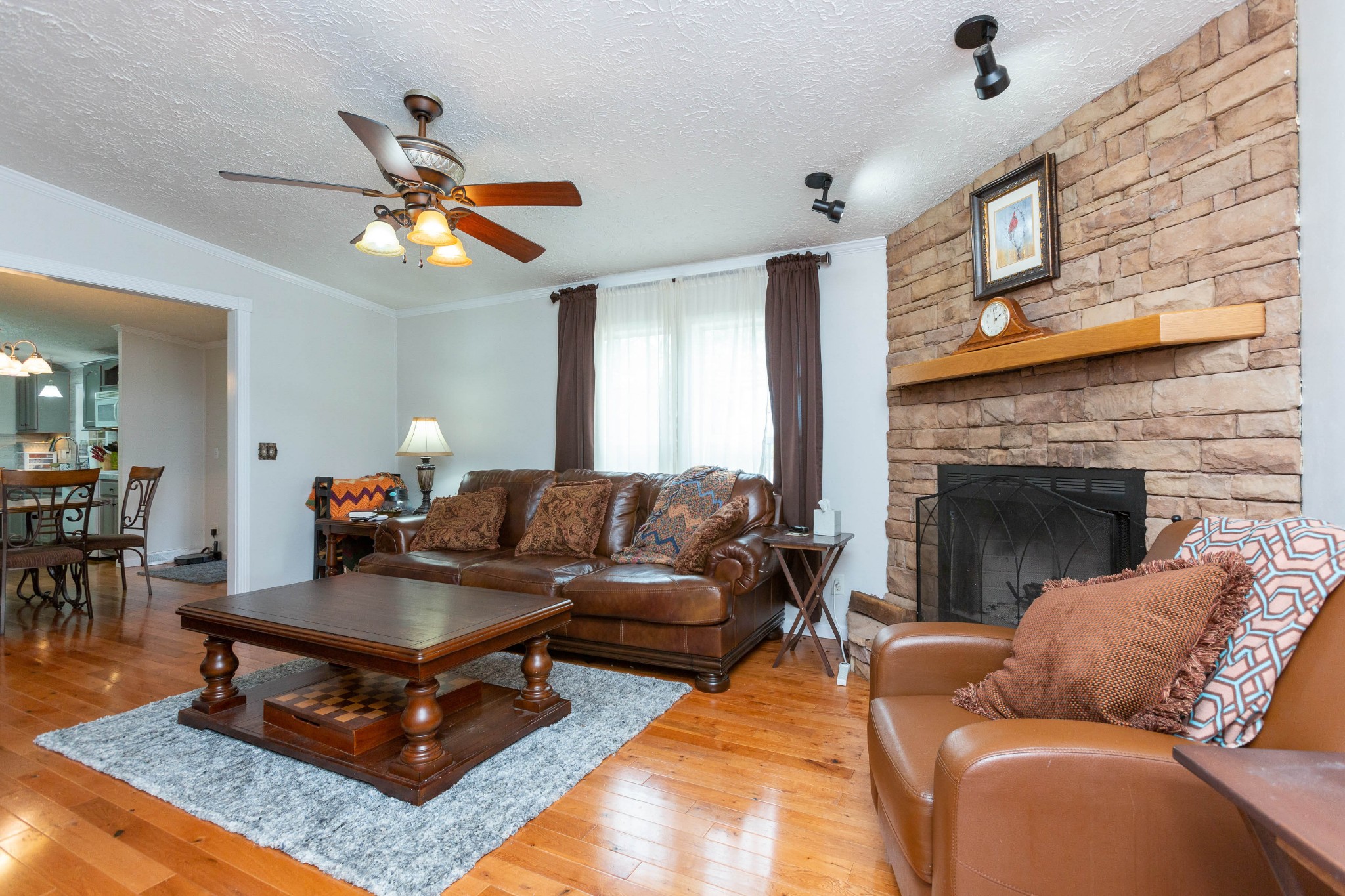 5425 Ashburn Road Springfield, TN 37172 - Photo 21 of 40 a living room with furniture and a fireplace