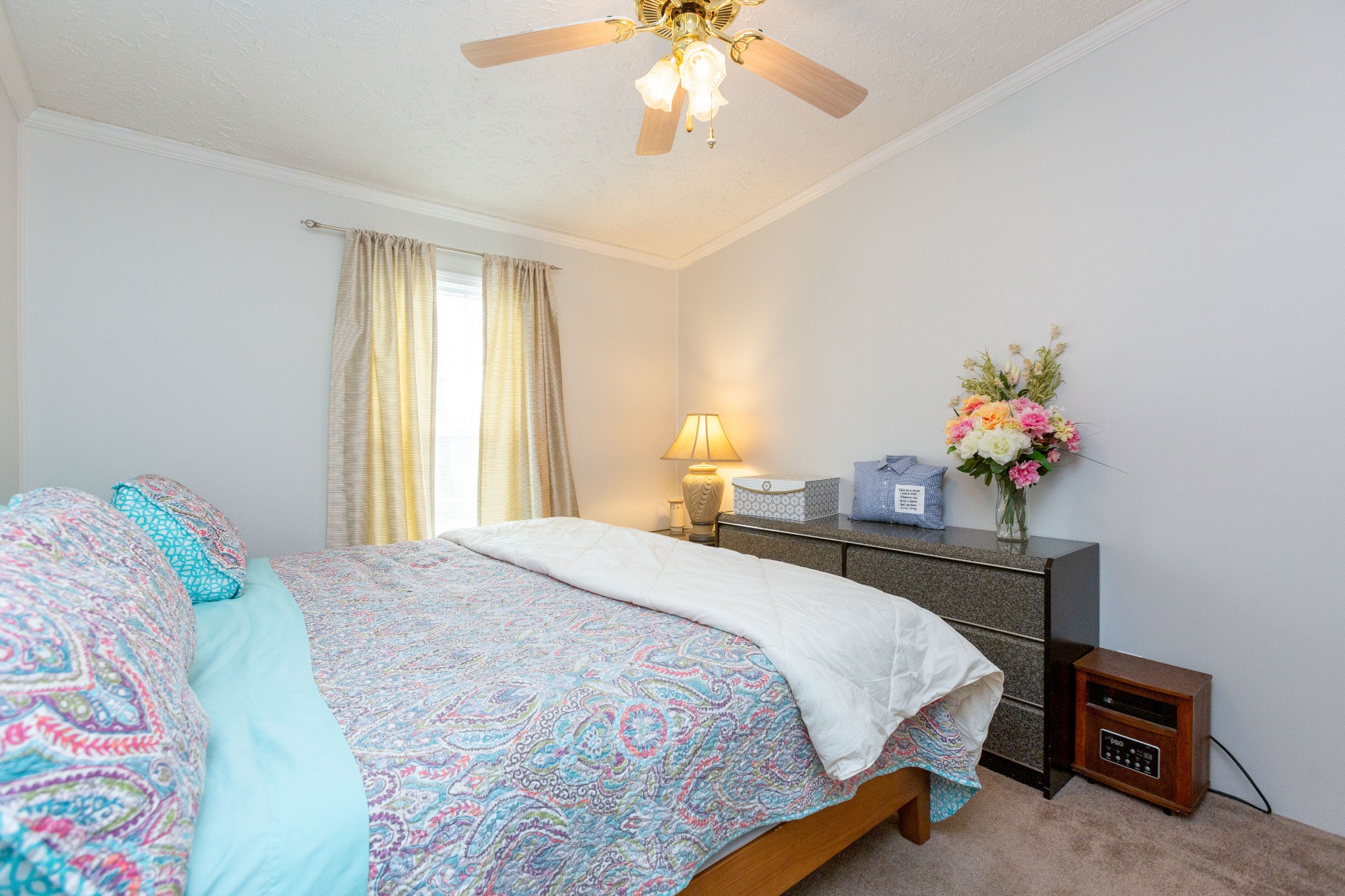5425 Ashburn Road Springfield, TN 37172 - Photo 24 of 40 a bedroom with a bed and a chandelier