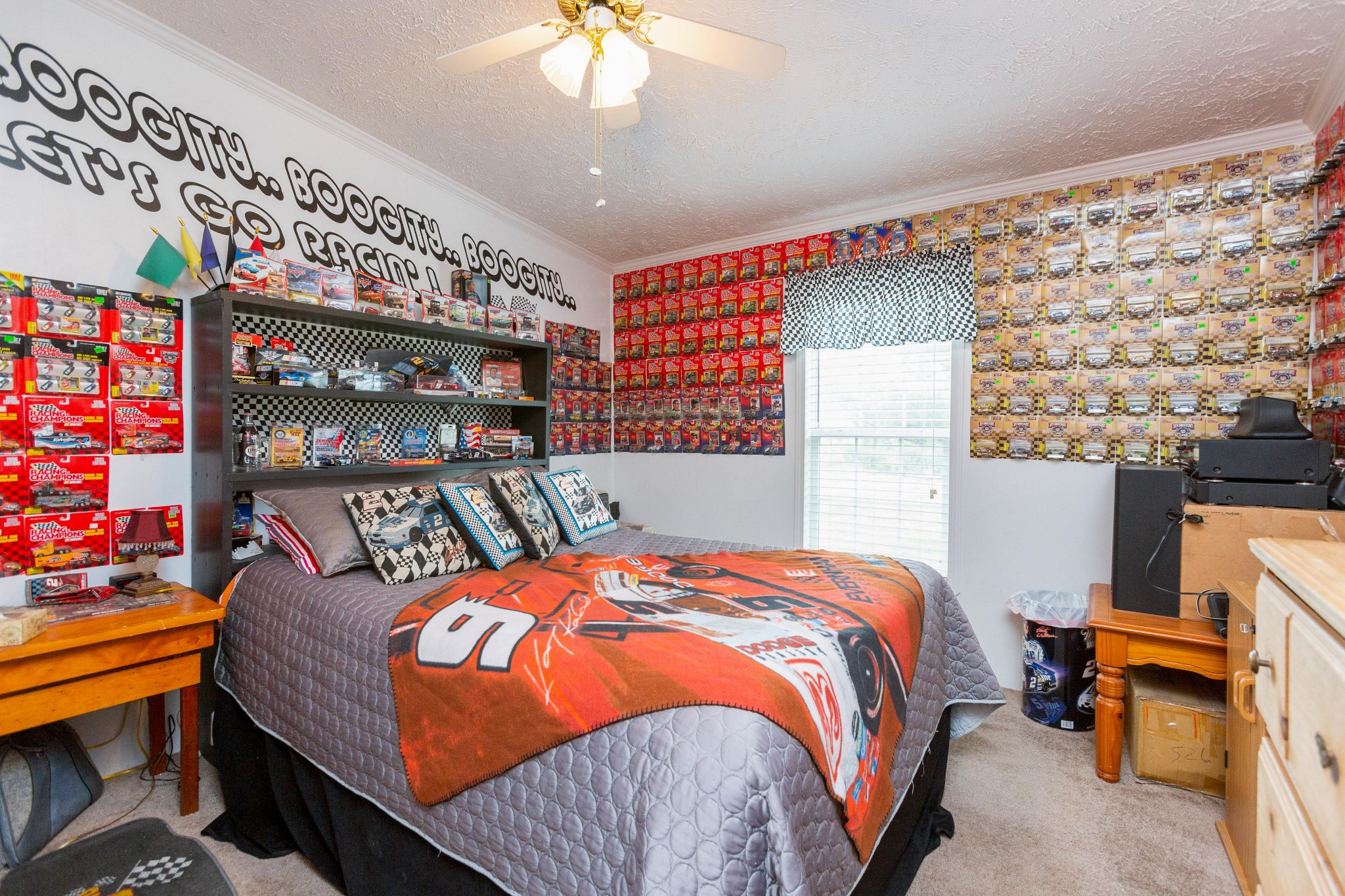 5425 Ashburn Road Springfield, TN 37172 - Photo 25 of 40 a bedroom with a bed and a chandelier