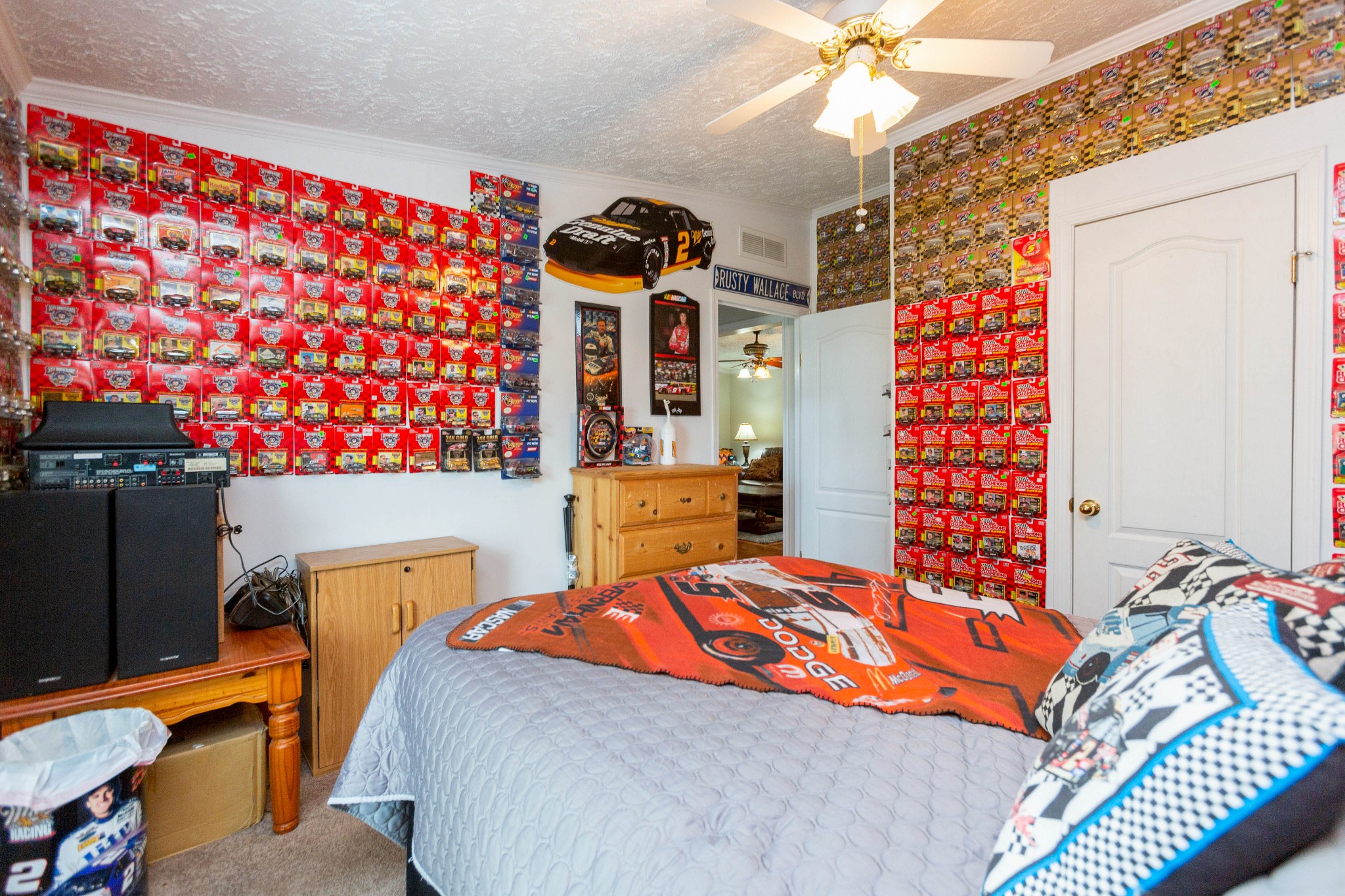 5425 Ashburn Road Springfield, TN 37172 - Photo 26 of 40 a bedroom with a bed and a chandelier