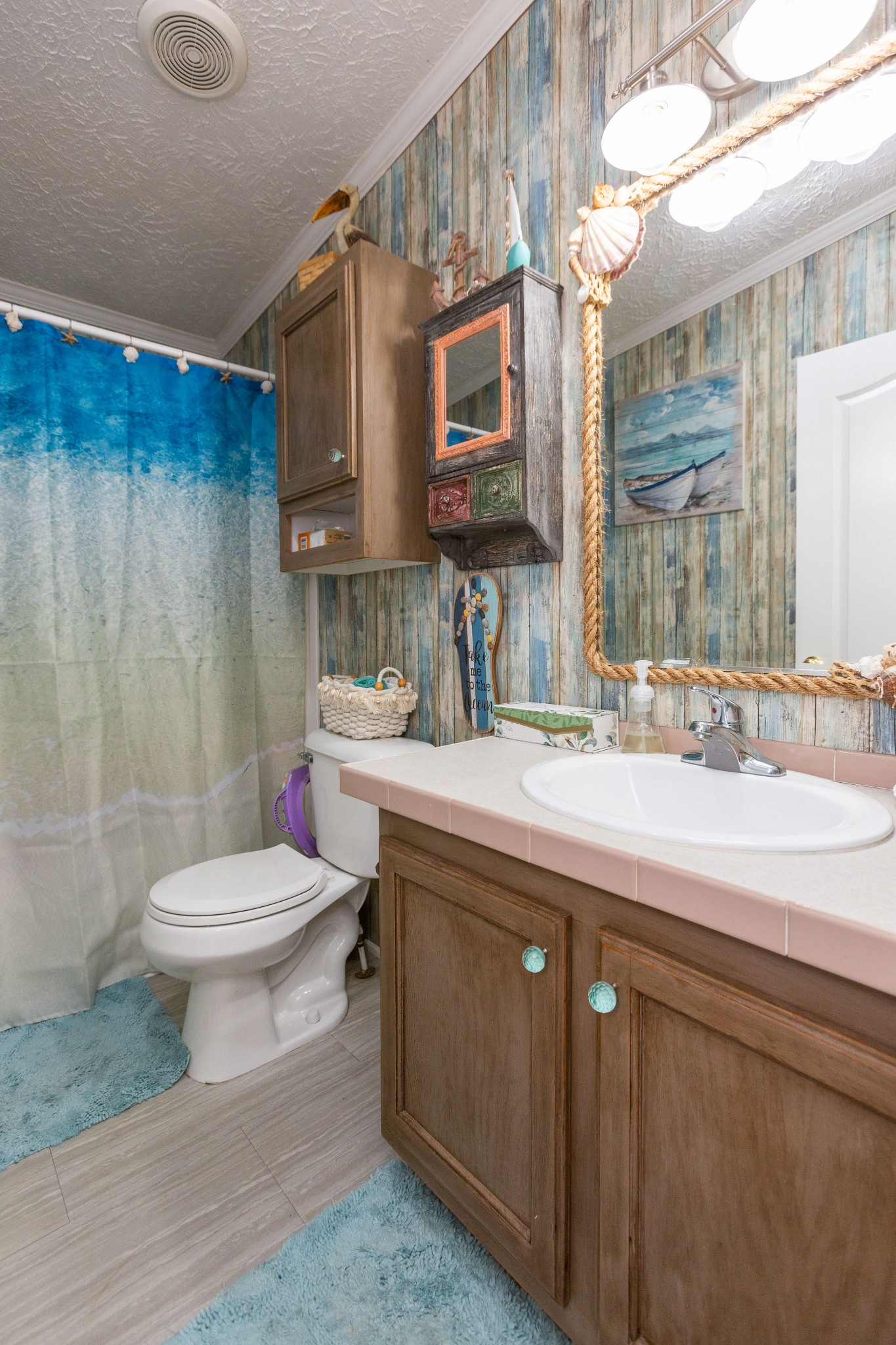 5425 Ashburn Road Springfield, TN 37172 - Photo 27 of 40 a bathroom with a sink a toilet and mirror