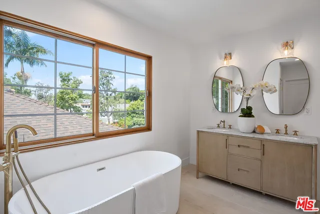 a bathroom with a shower and a toilet