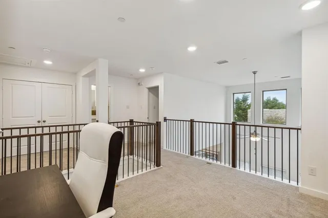 a bathroom with 2 sink and a mirror