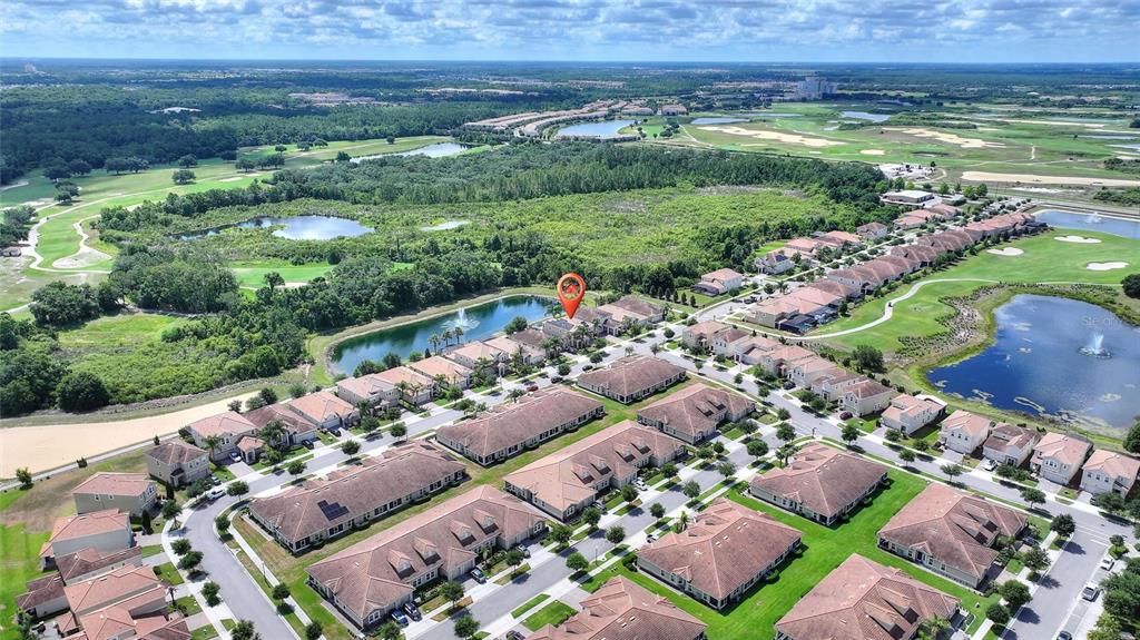 1089 Blackwolf Run Road Davenport, FL 33896 - Photo 59 of 82 a view of a city with lots of flower around