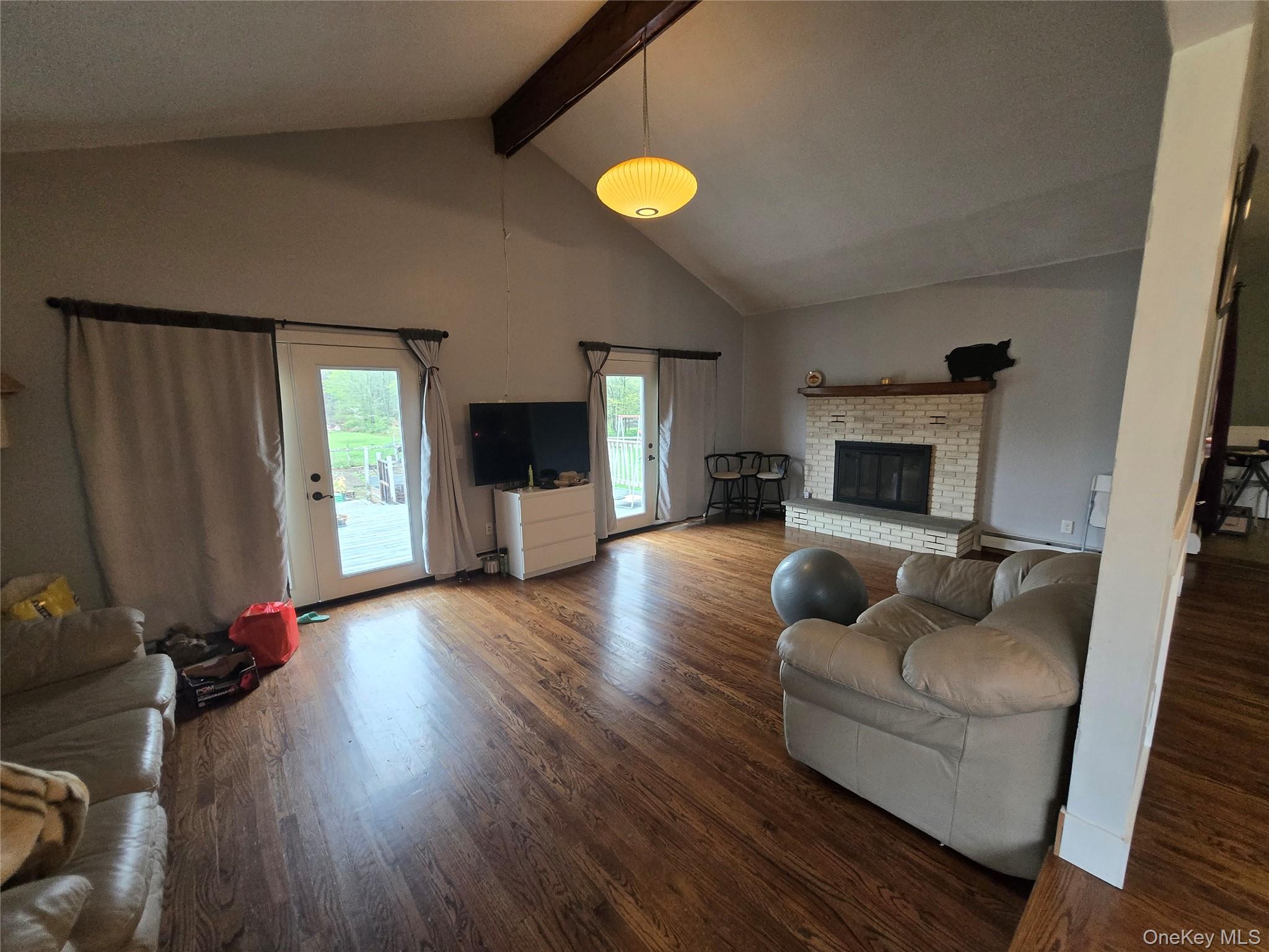 234 Sinsabaugh Road Pine Bush, NY 12566 - Photo 12 of 15 a living room with furniture and a fireplace