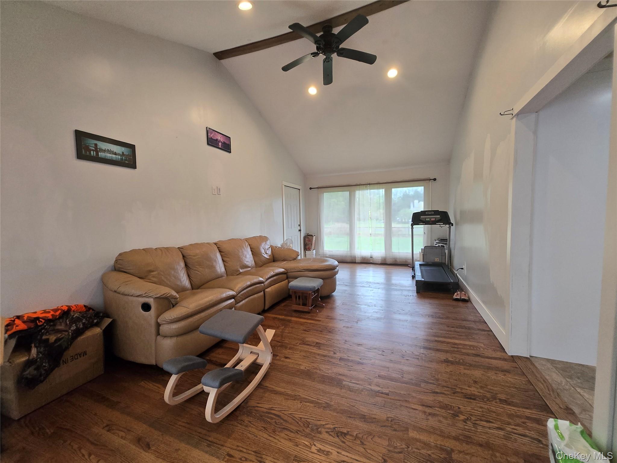 234 Sinsabaugh Road Pine Bush, NY 12566 - Photo 14 of 15 a living room with furniture and a wooden floor