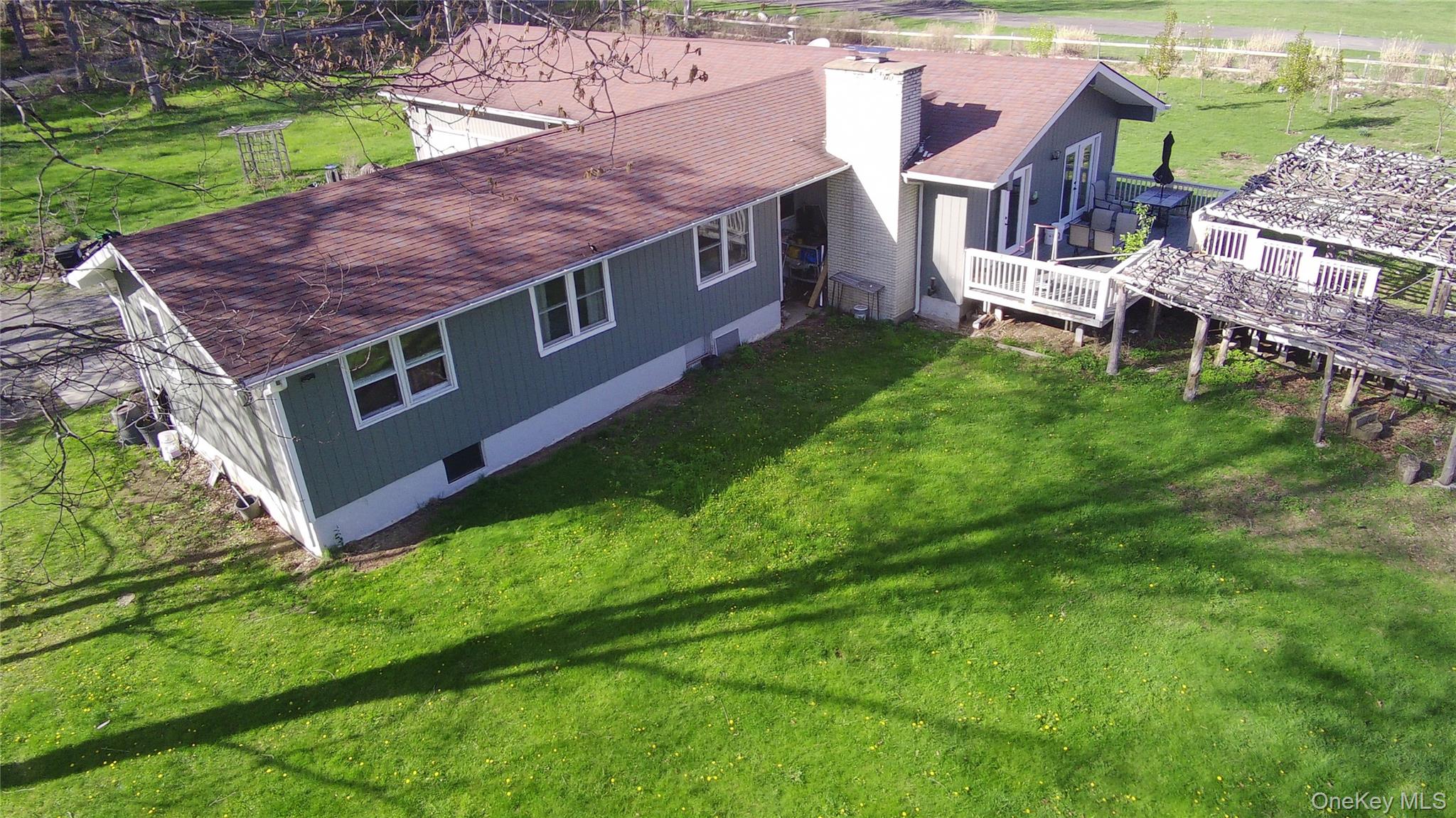234 Sinsabaugh Road Pine Bush, NY 12566 - Photo 3 of 15 an aerial view of a house with a yard