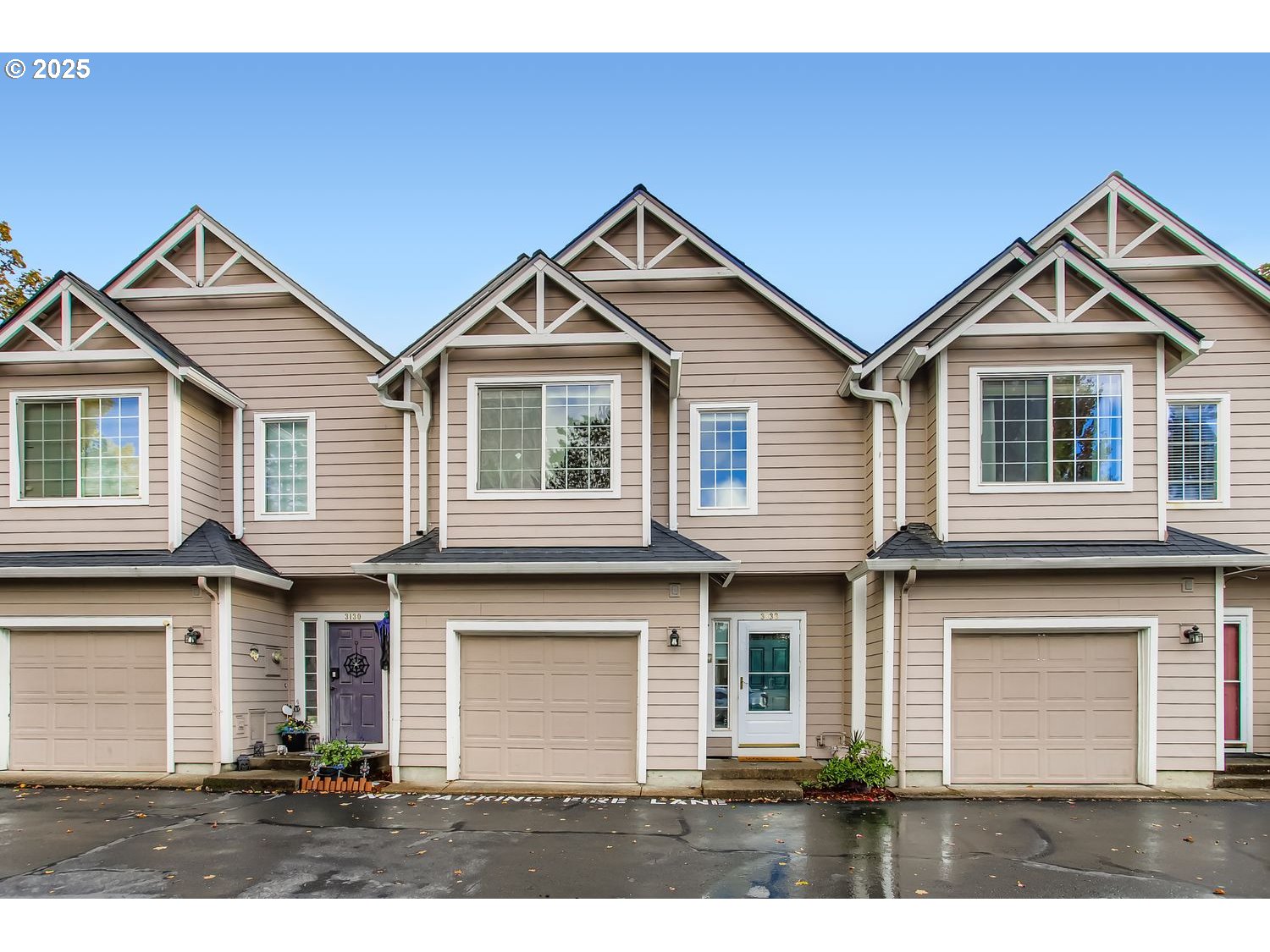 3138 Southwest 177th Place Beaverton, OR 97003 - Photo 1 of 28 a front view of a house with a yard and garage