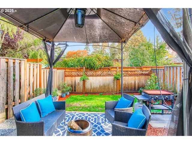 a view of yard with patio