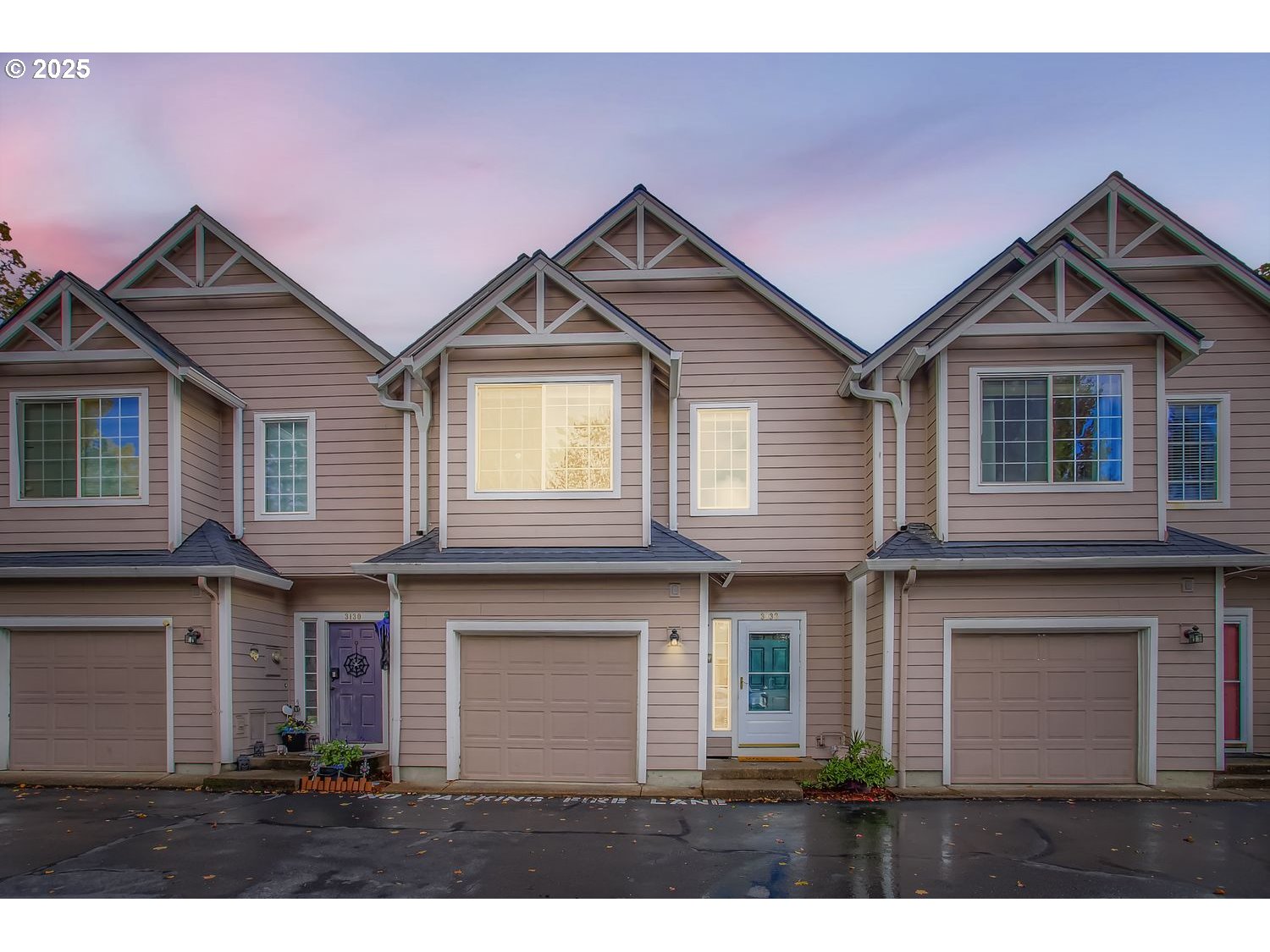 3138 Southwest 177th Place Beaverton, OR 97003 - Photo 26 of 28 a front view of a house with a yard and garage
