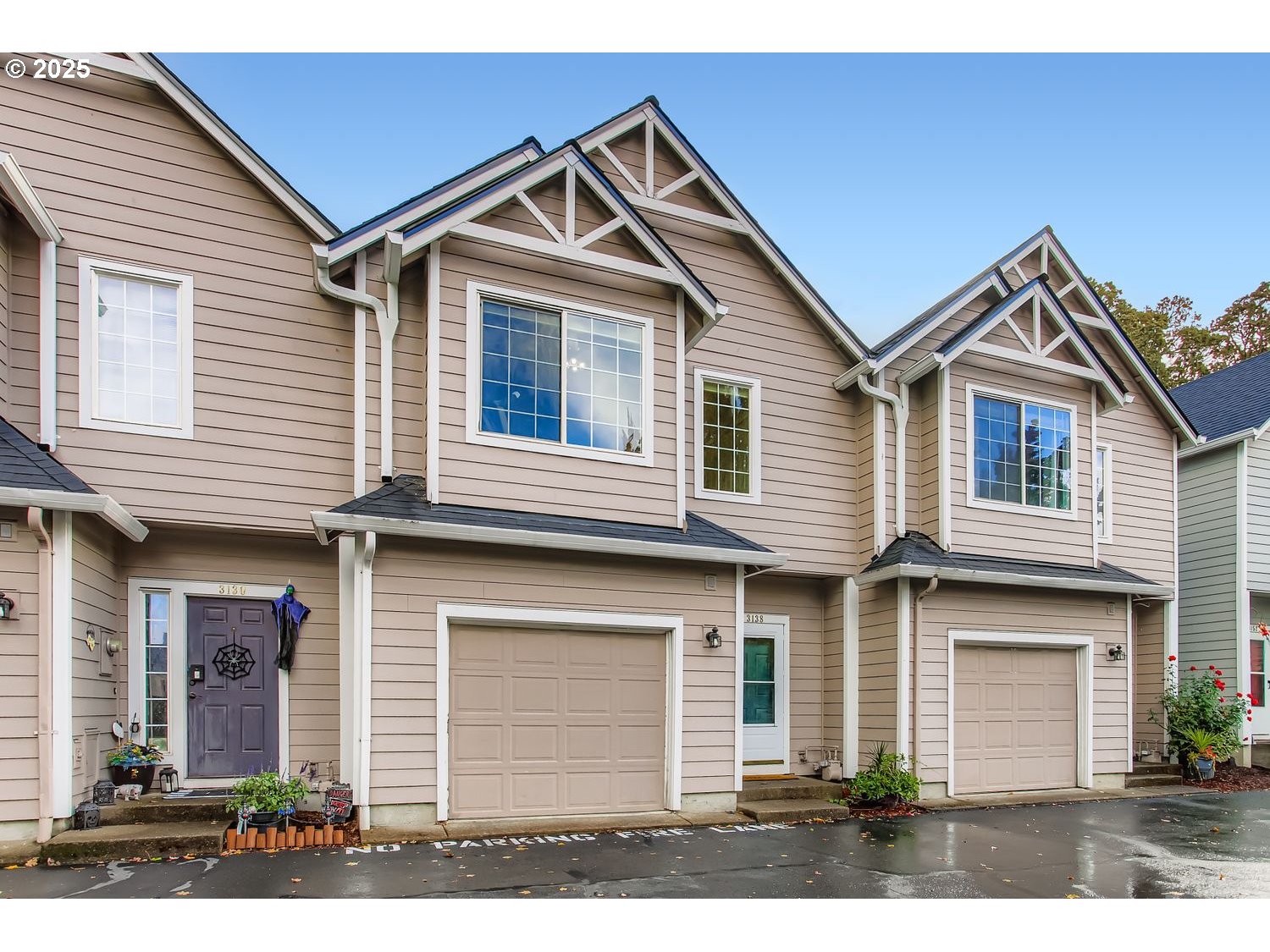 3138 Southwest 177th Place Beaverton, OR 97003 - Photo 27 of 28 a front view of a house with a yard and garage