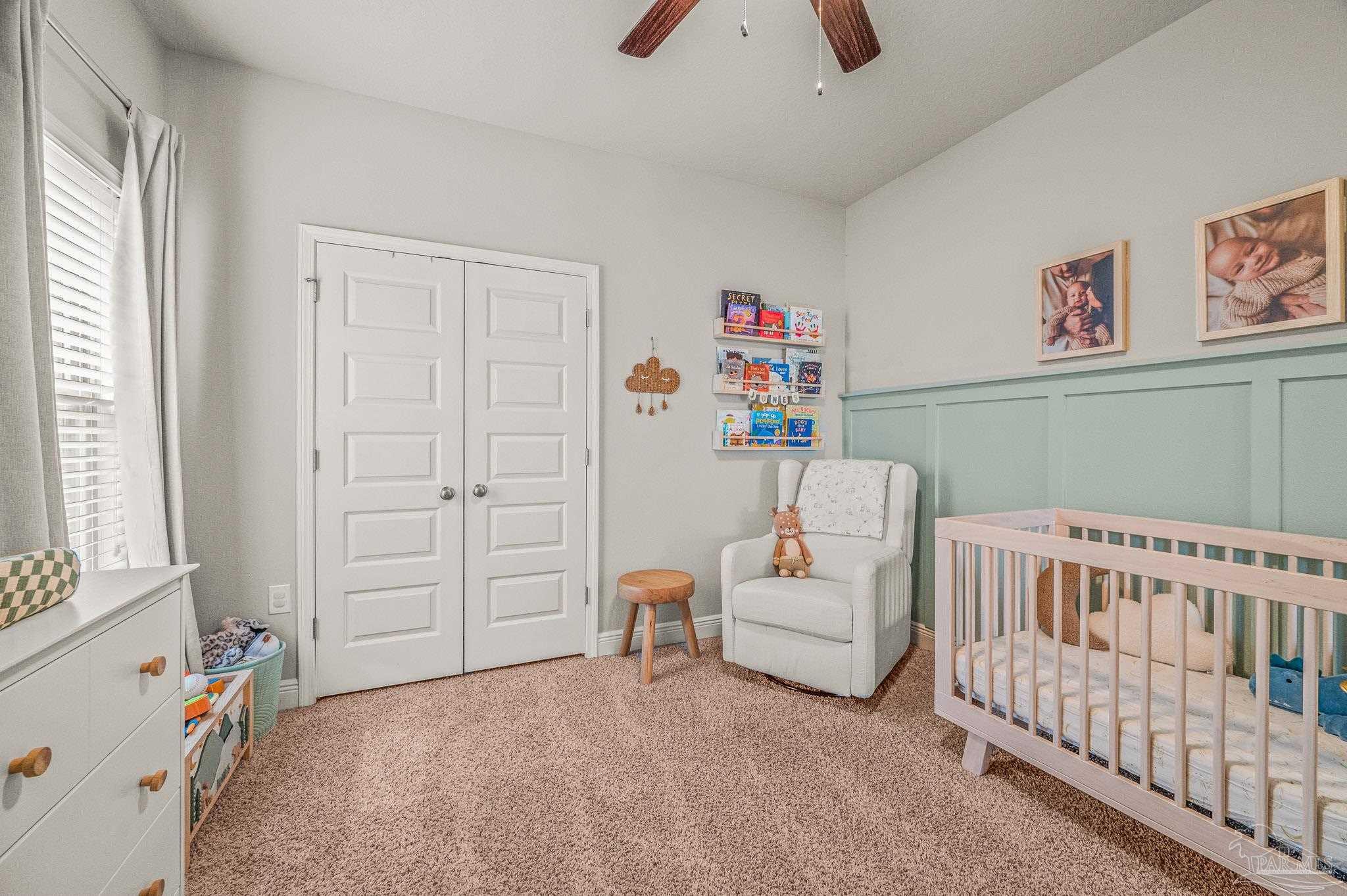 5329 Talon Road Pace, FL 32571 - Photo 30 of 45 a bedroom with furniture and a window