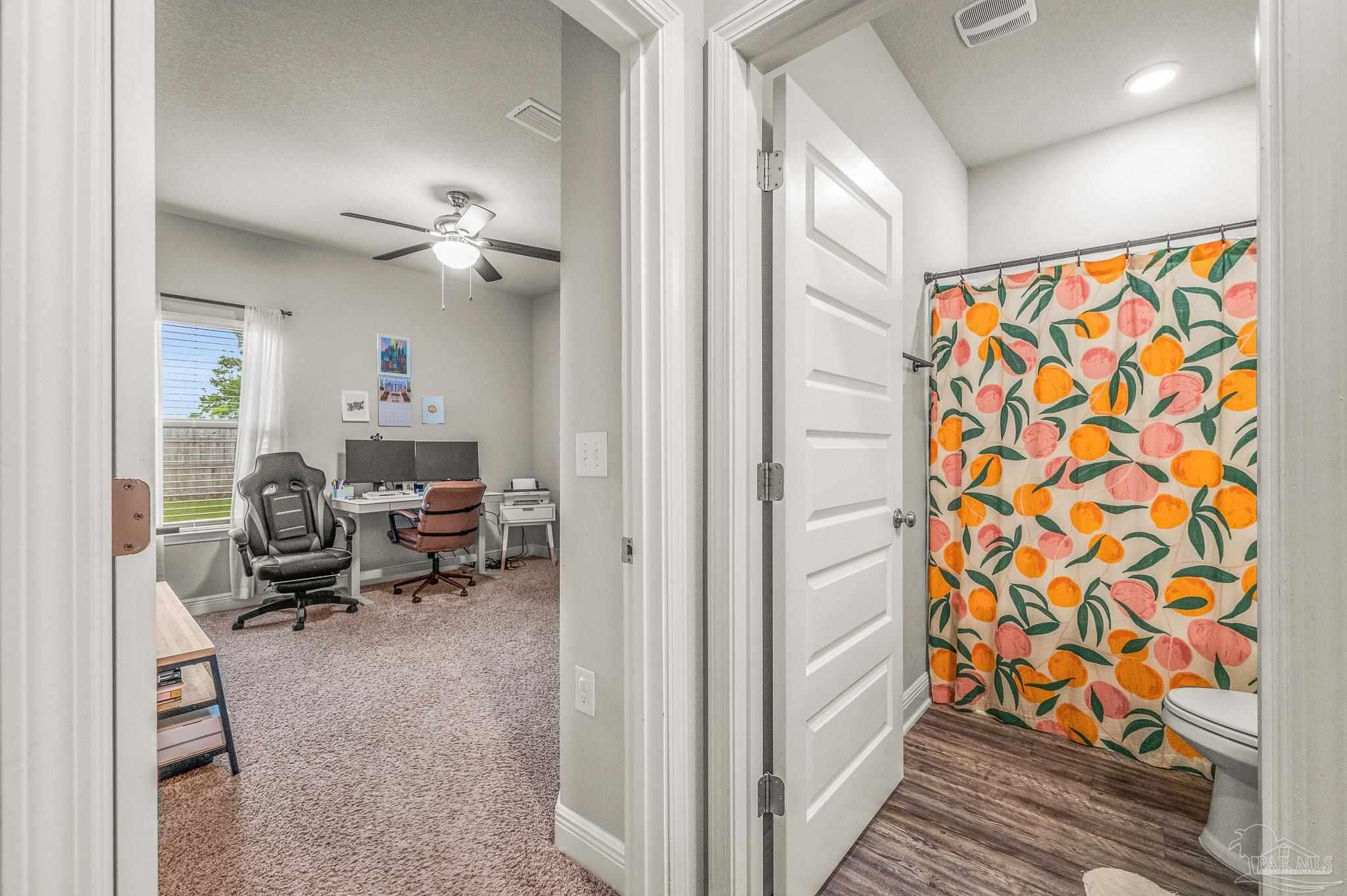 5329 Talon Road Pace, FL 32571 - Photo 33 of 45 a living room with furniture and a rug