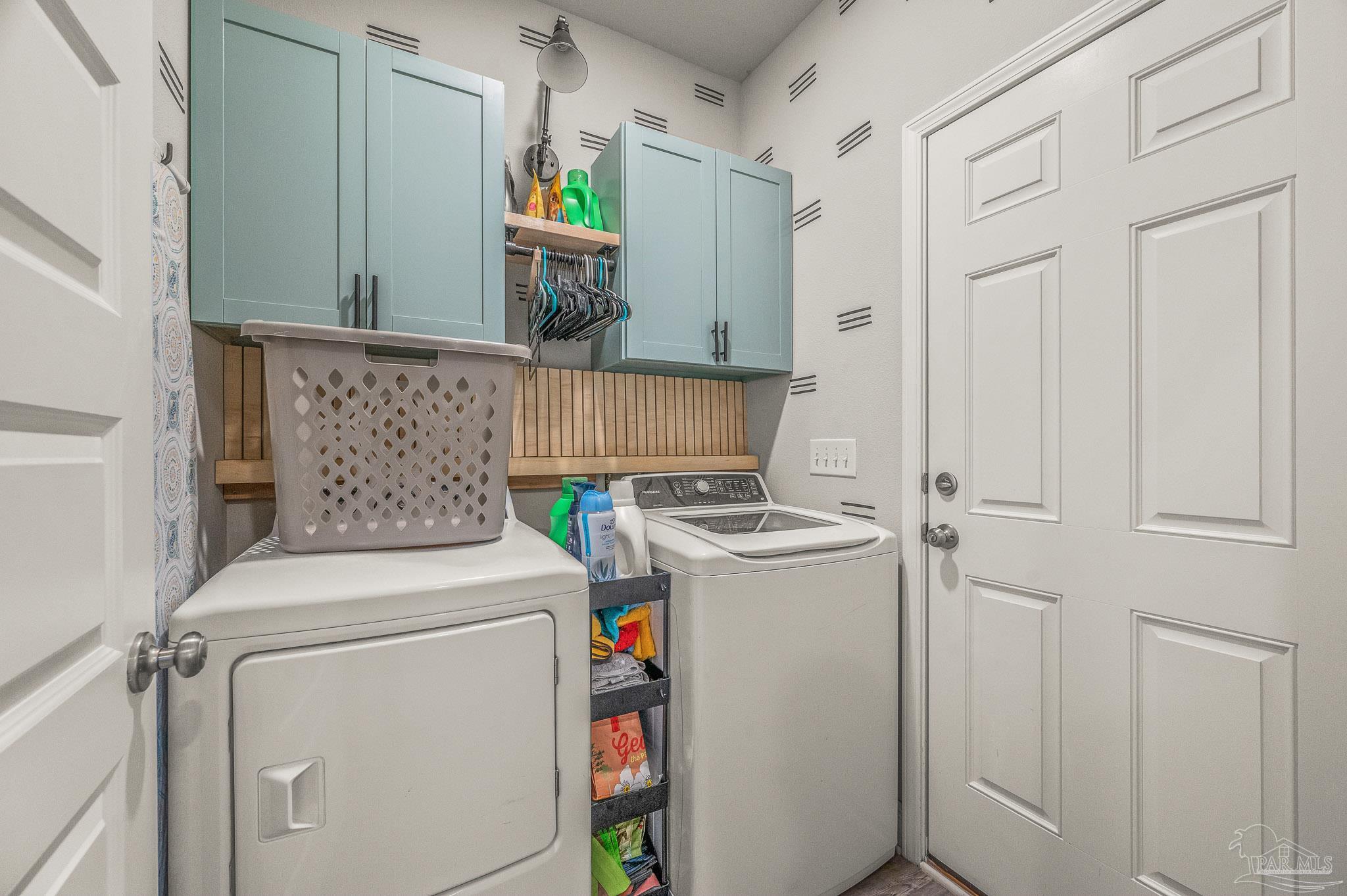 5329 Talon Road Pace, FL 32571 - Photo 40 of 45 a utility room with dryer and washer