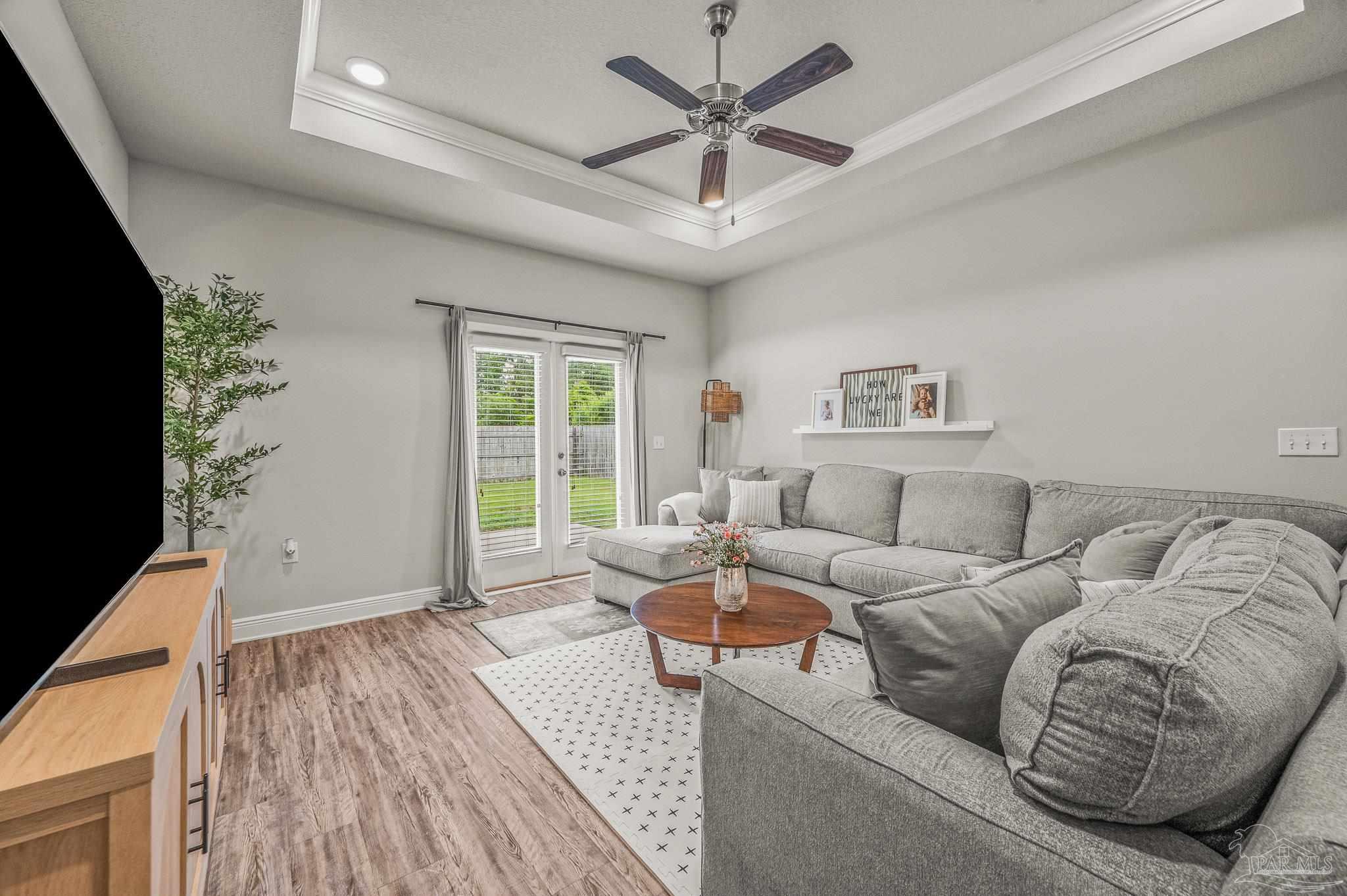 5329 Talon Road Pace, FL 32571 - Photo 4 of 45 a living room with furniture and a window