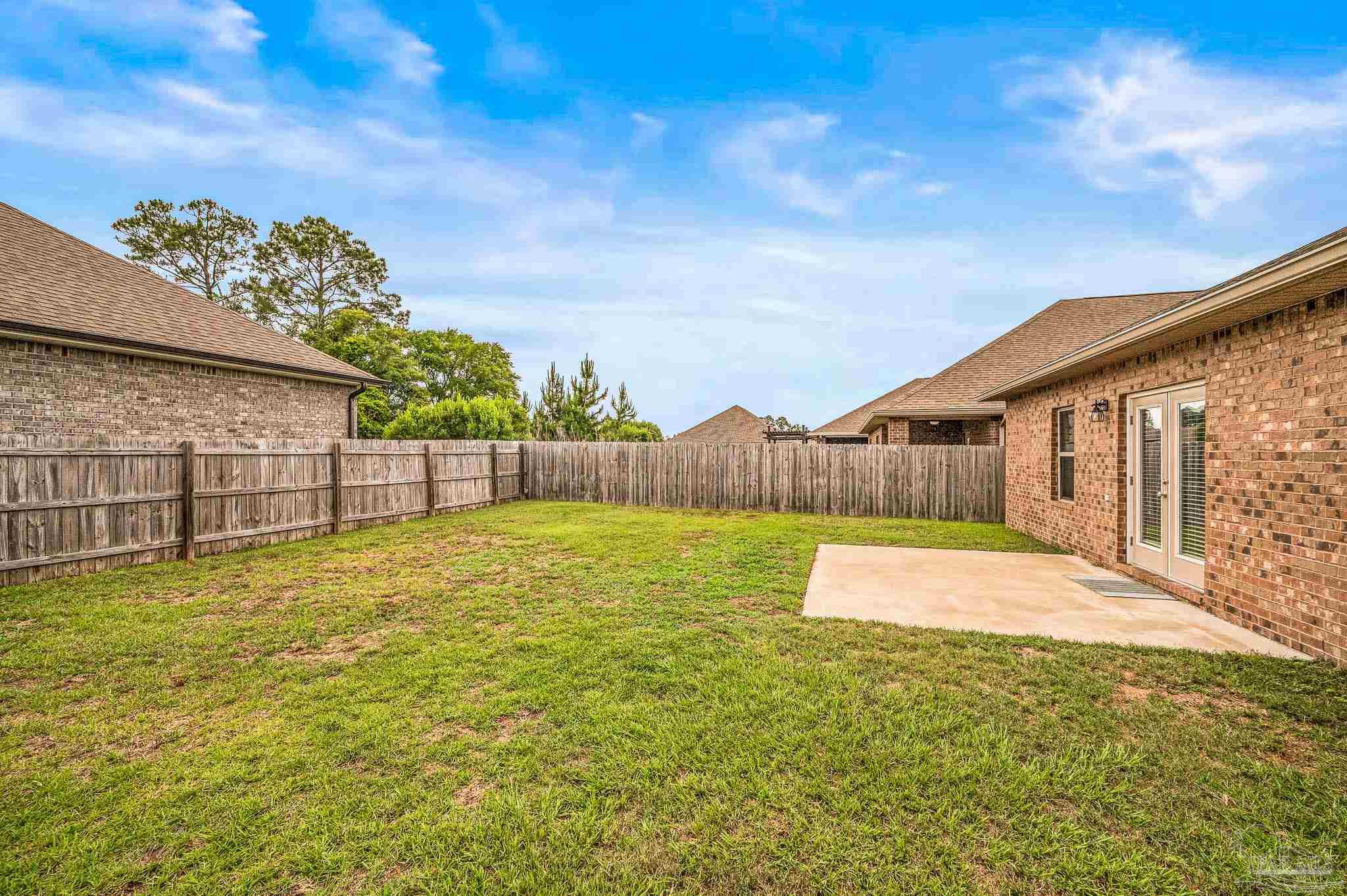 5329 Talon Road Pace, FL 32571 - Photo 42 of 45 a view of a backyard