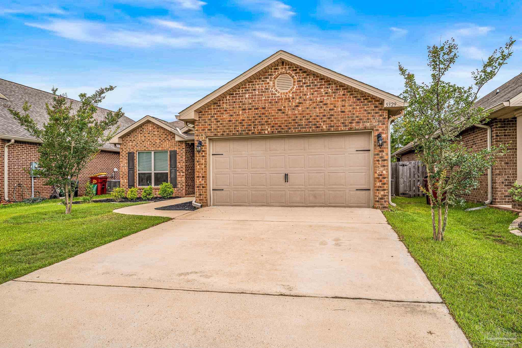 5329 Talon Road Pace, FL 32571 - Photo 44 of 45 front view of house with a yard