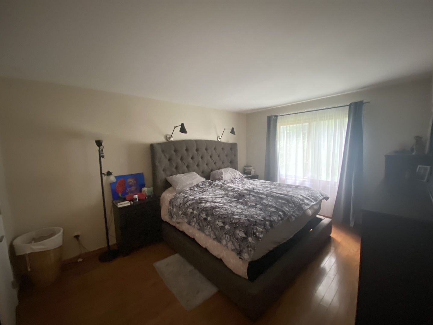 1748 Brookdale Road Naperville, IL 60563 - Photo 18 of 28 a bedroom with a bed and a window