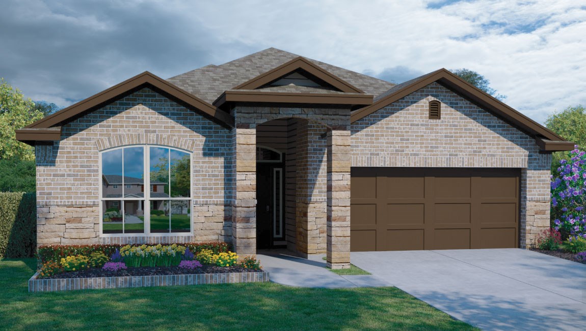 a front view of a house with a garden and plants