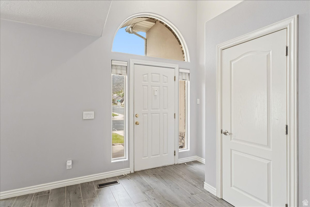 7 Reflection Way St. George, UT 84770 - Photo 10 of 54 Entrance foyer featuring plenty of natural light and light wood-style flooring