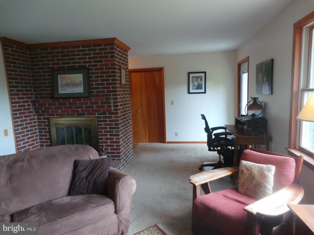 197 Packing House Road Berkeley Springs, WV 25411 - Photo 12 of 65 Fireplace in the living room