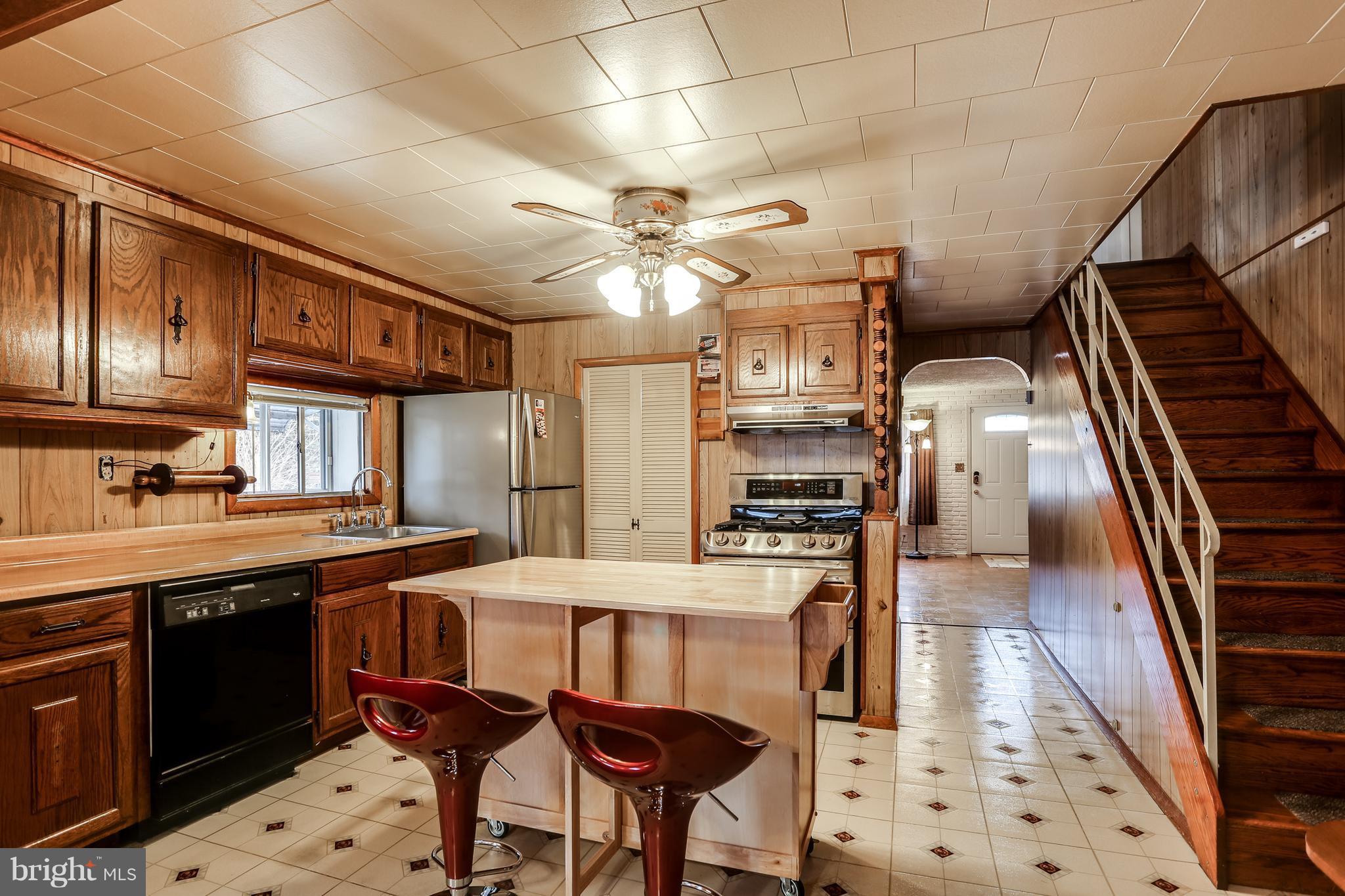 2701 Yarnall Road Baltimore, MD 21227 - Photo 6 of 27 Kitchen with Island and New Appliances