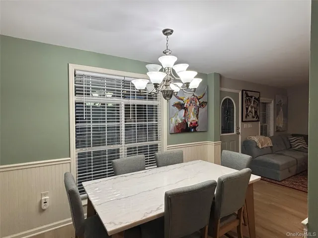 a bathroom with a toilet a sink and a shower