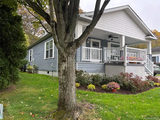 a front view of a house with a glass door