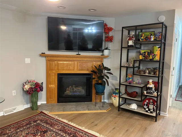 a dining room with furniture and chandelier